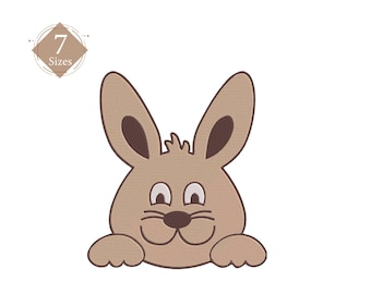Puede incluir: Un conejo de dibujos animados marrón con ojos blancos y una nariz marrón asomándose por el borde de una superficie blanca.