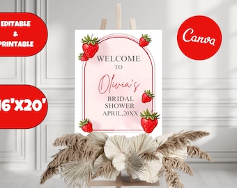 Könnte beinhalten: Ein weißes, bedruckbares Schild mit rosa Hintergrund und rotem Rand. Das Schild lautet "Willkommen zum Bridal Shower von Olivia April, 20XX". Das Schild ist mit Erdbeeren verziert.
