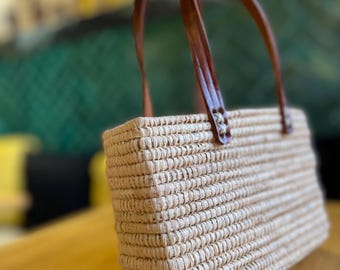 Moroccan basket served from raffia and straw