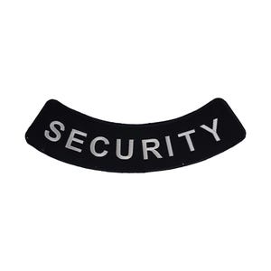 May include: A black, curved patch with the word "SECURITY" embroidered in white. The patch is a semi-circle shape, and the text is in a bold, sans-serif font. The patch is likely for a security uniform or related apparel.
