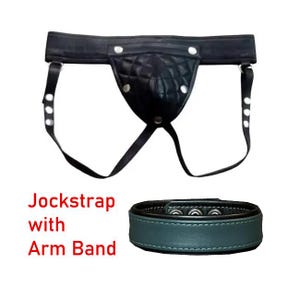 May include: Black jockstrap with a quilted pouch and adjustable straps. Includes a matching teal arm band. The text "Jockstrap with Arm Band" is displayed in red.
