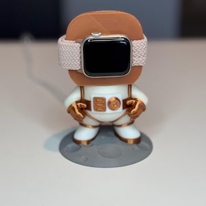 Soporte para cargador de Apple Watch con astronauta