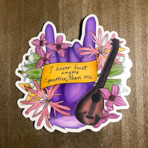 May include: Purple hand with a yellow banner that says "I never trust anyone prettier than me" with a lute and pink flowers.