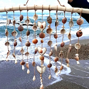 Seashell Wall Hanging: Handmade Beach Decor with Crocheted Hearts