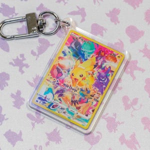 Porte-clés holographique en acrylique Pikachu 160 Couronnes Zenith Pokémon TCG