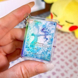 Porte-clés acrylique holographique de la carte miniature Artikodin 161 Journey Together Pokémon TCG