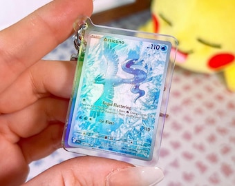 Holographic acrylic keychain of the Articuno 161 Journey Together Pokémon TCG miniature card