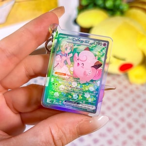Llavero holográfico acrílico de carta Lillie’s Clefairy ex 184 Journey Togheter Pokémon TCG en miniatura