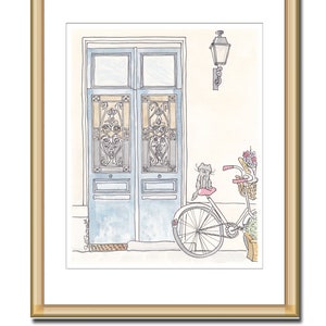 French blue doors with ornate iron and sweet cat on bicycle illustration by shell sherree - gold frame and mat example