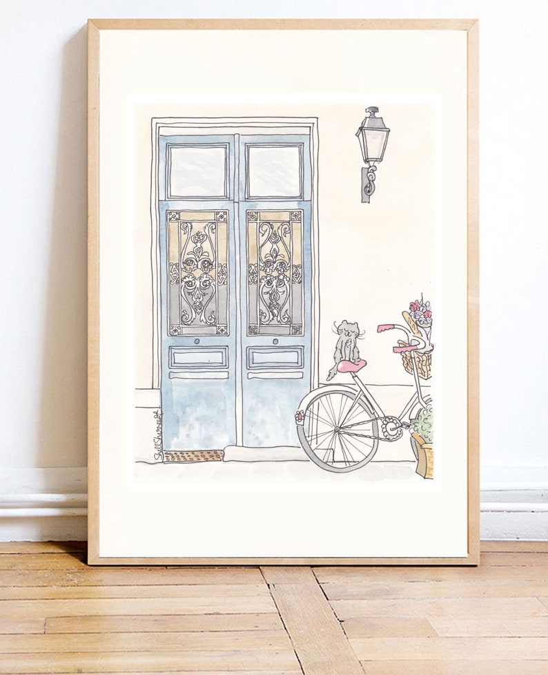 French blue doors with ornate iron and sweet cat on bicycle illustration by shell sherree - large framed example