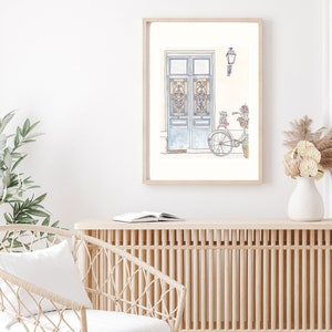 French blue doors with ornate iron and sweet cat on bicycle illustration by shell sherree - in room setting example