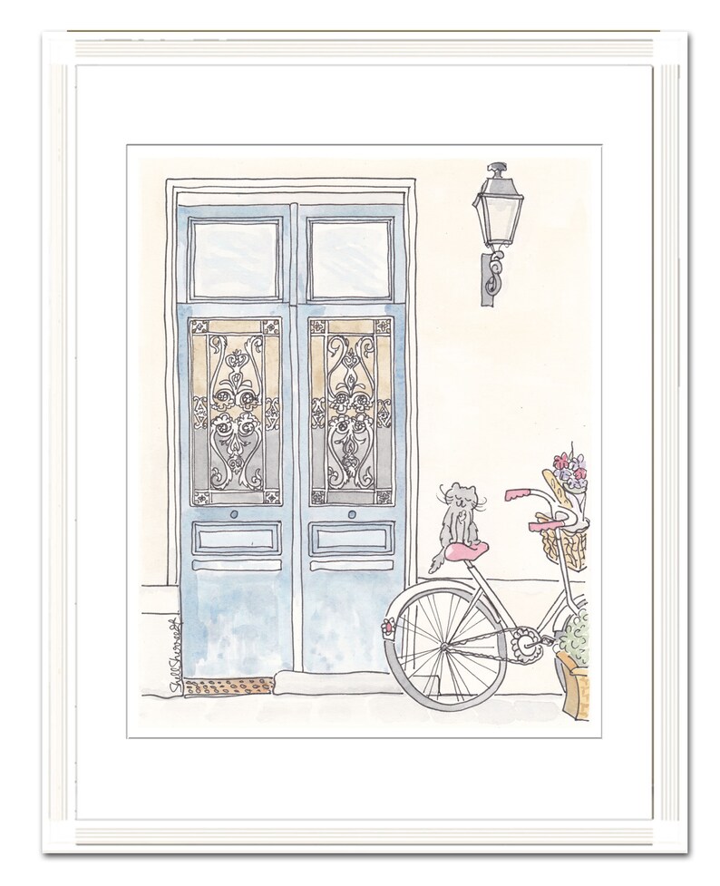 French blue doors with ornate iron and sweet cat on bicycle illustration by shell sherree - white frame and mat example