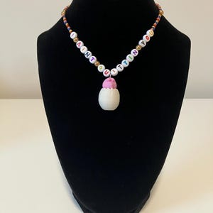 I Ain't Quittin' You Jedtavius Dinosaur Puzzle Eraser Charm Beaded Necklace