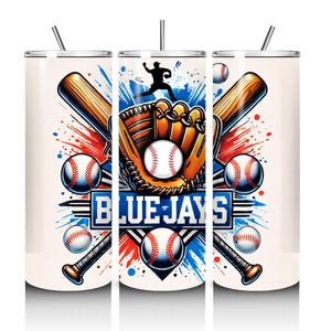 May include: A white tumbler featuring a baseball theme with the text "BLUE JAYS". The design includes baseballs, bats, a glove, and a silhouette of a baseball player, with red and blue accents.