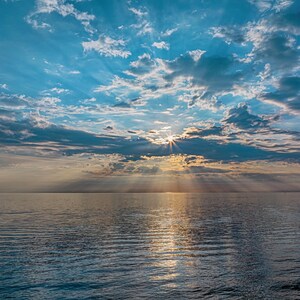 Lake Michigan shoreline sunrise sunset Pure Michigan West Michigan summer sky beach blue green warm rays drone wall art Mike010_2023d