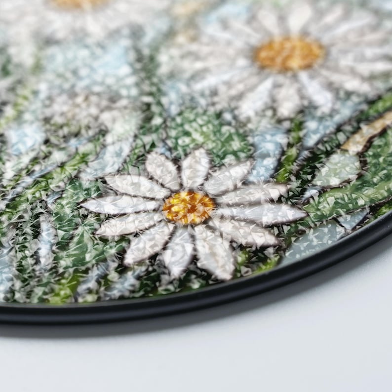 a close up of a plate with flowers on it