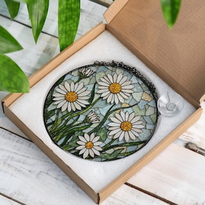 a box that has a picture of flowers inside of it