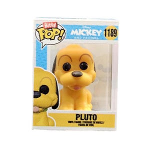 May include: A yellow and black Pluto Funko Pop! figure in a clear plastic box with a white background. The box has the words "Bitty Pop! Mickey and Friends" and "1189" on it. The figure is standing on a white base and has a yellow tongue sticking out.