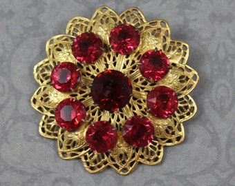 Vintage Red Glass Cabochon and Rhinestone Czech Embossed Golden Rectangular Brooch