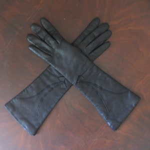 Vintage French Kislav Lined Black Leather Mid Length Bow Accented Gloves Size 6 1/2