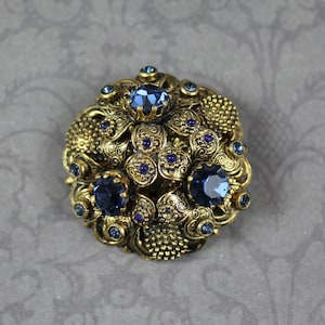 Vintage Golden Filigree Blue Rhinestone Round Filigree Brooch