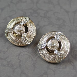 Vintage 1960s to 1970s Kramer Designer Round Gold Tone Rhinestone Accented Clip On Earrings