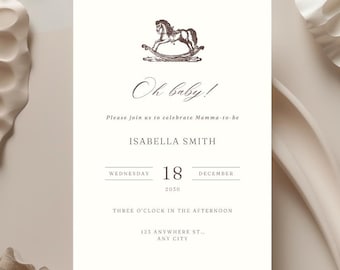 May include: A white baby shower invitation with a black and white illustration of a rocking horse. The text reads "Oh baby!" and includes the date, time, and location of the event.