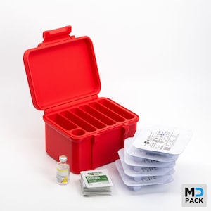 May include: A bright red, open medical supply case with multiple compartments. The case is next to a stack of medical supplies, including alcohol prep pads, vials, and packaged medical items. The MD Pack logo is in the bottom right corner.