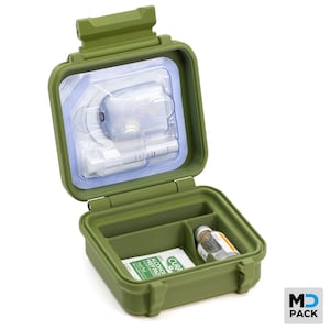 May include: An open, olive-green, hard-shell case with a hinged lid. The case contains a clear plastic insert with medical supplies, including a syringe. The lower compartment holds a vial, alcohol prep pads, and has two dividers. The case is labeled "MD PACK".