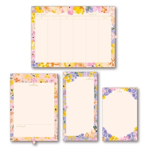 May include: A set of floral-themed stationery items, including a weekly planner and three notepads. The planner features a grid layout with the words "MY WEEK" and "WEEK OF." The notepads have floral borders in yellow, pink, and purple.