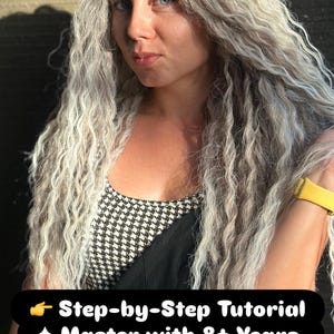 Model with long silver wavy braids, demonstrating safe painless braiding method