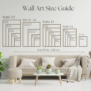The image is a wall art size guide that provides the dimensions of various wall art pieces in centimeters. It includes a sofa with a coffee table and decorative items such as potted plants and vases.