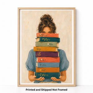 May include: An oil painting print featuring a person with a messy bun hairstyle wearing a blue puff-sleeve top, holding a tall stack of nine colorful books with floral spine details. The books are stacked vertically, obscuring the person's face.