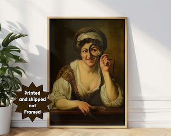 May include: A framed print of a classical painting featuring a woman holding a magnifying glass to her eye. She wears a white blouse, brown and white patterned top, and a head covering. The print is displayed next to a potted plant. The text "Printed and shipped not Framed" is visible.