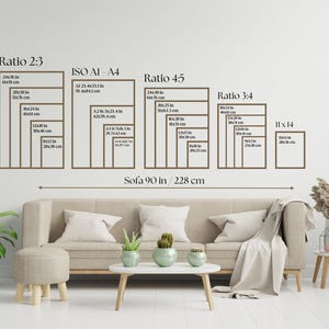a living room with a sofa, a coffee table, and various decorative elements such as potted plants and vases. The sofa is positioned in front of a wall with a series of frames arranged in a grid-like pattern, each frame representing a different sofa size. The image also includes a scale that provides the size of the sofa in relation to the frames, allowing viewers to understand the dimensions of the sofa in comparison to the frames.
