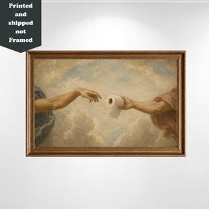 A framed painting depicting two hands reaching towards each other, with one hand holding a roll of toilet paper.