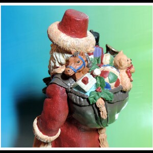 10" Tall Santa Claus Carring Christmas Tree. Antique Hand Pained
