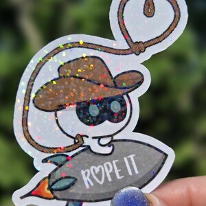 Rope IT!! BTS Jin-inspired Sticker Featuring Cowboy Wootteo Lassoing up ...