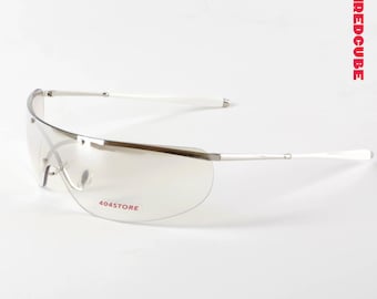 Silver Rave Shield Sunglasses - Sleek Cyberpunk Rimless Wraparound Frames