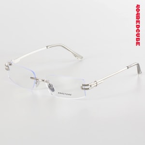 May include: Rimless spectacles with silver metal frames. The rectangular, clear lenses have the brand name "404STORE" printed on the lower left lens. The image is set against a white background.