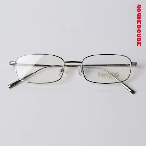 Gafas unisex de estilo vintage de los años 90, rectangulares y estrechas, con lentes transparentes clásicas de metal fino.