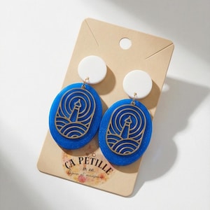 May include: A set of three ceramic mugs with a speckled, matte finish. The mugs are in shades of cream, light gray, and dark gray. Each mug has a simple, minimalist design and a rounded handle.