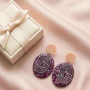 MARINE > Resin and glitter drop earrings https://www.instagram.com/capetille_jjl?igsh=MW5ueHBwcngzaXltaA