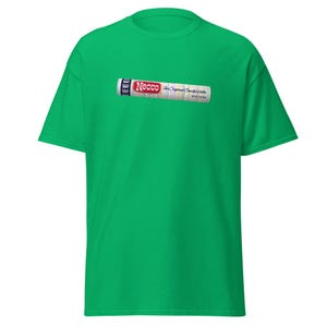 May include: A green t-shirt with a vintage Necco wafer candy bar graphic. The graphic says "The Original Sweet Wafer" and "Necco" in blue text.