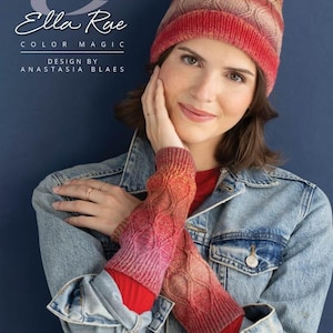 May include: A woman wearing a red, pink, and gold knit hat and matching arm warmers. The hat and arm warmers have a repeating diamond pattern. The text "Ella Rae Color Magic" is visible in the upper left corner.