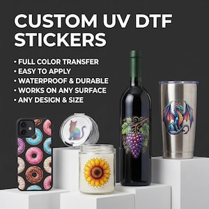May include: Image showcasing custom UV DTF stickers applied to various items. Includes a phone case with donut design, a compact mirror with a cat, a candle with a sunflower, a wine bottle with grapes, and a stainless steel tumbler with a dragon.