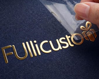 Calcomanías con logotipos personalizados: pegatinas metálicas y transferencias UV DTF para embalaje, vidrio y plástico.