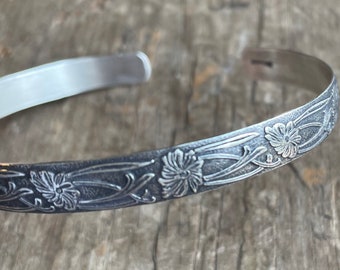 Floral silver cuff bracelet 7mm wide sterling silver floral cuff solid sterling silver with a floral and vine design