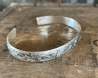 Floral silver cuff bracelet 8mm wide solid sterling silver floral cuff solid sterling silver with a floral and vine design