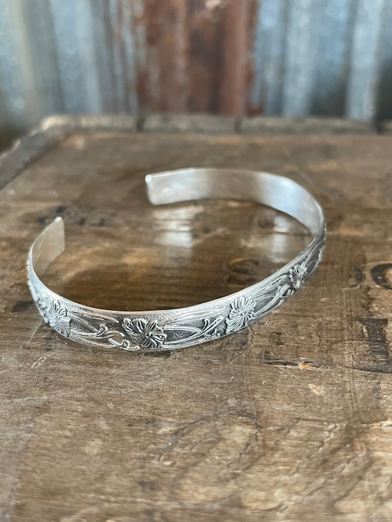 Floral silver cuff bracelet 8mm wide solid sterling silver floral cuff solid sterling silver with a floral and vine design